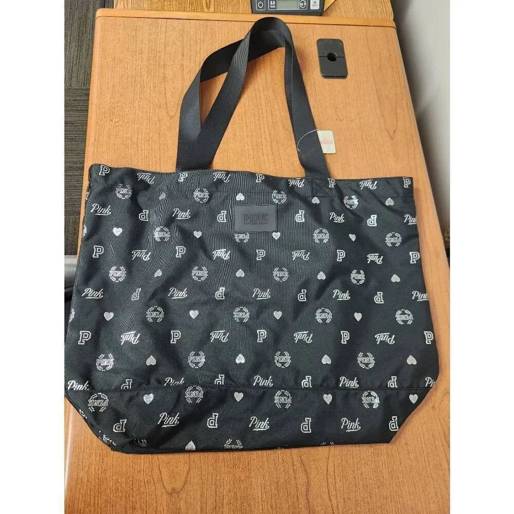 NWT Victoria’s Secret Pink Black Logo Bag with Silver logos.